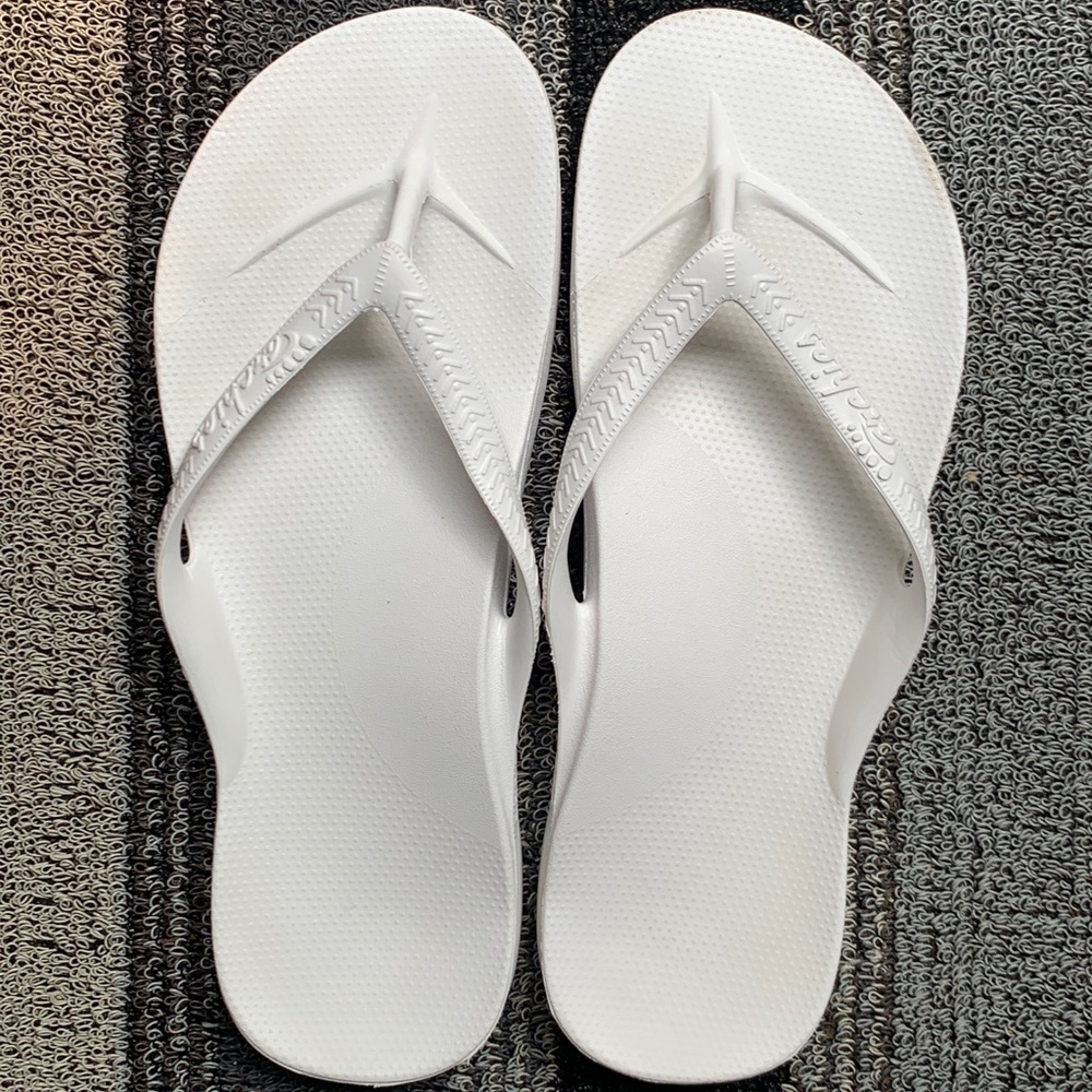 Archies white flip flops size 9 women’s
